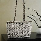 black_chanel_bag_with_black_chain