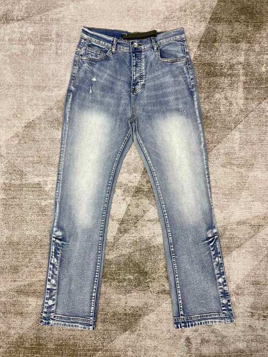 Men’s Relaxed Fit Light Blue Distressed Jeans with Button Cu