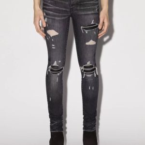 Distressed Black Skinny Jeans with Ripped Details for Women
