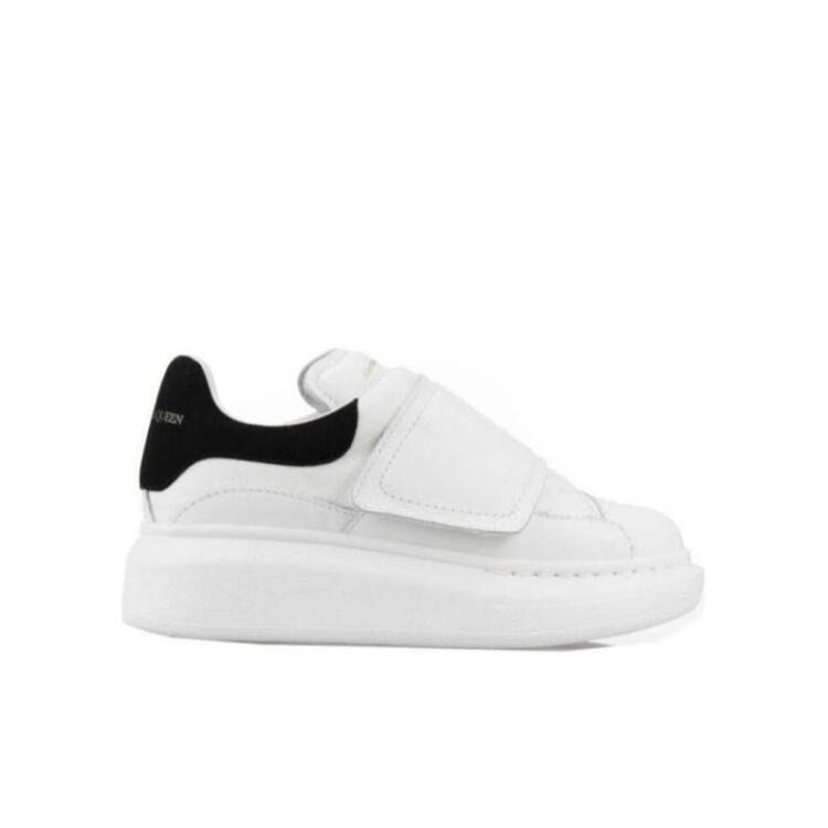 White Leather Slip On Sneakers with Black Accent