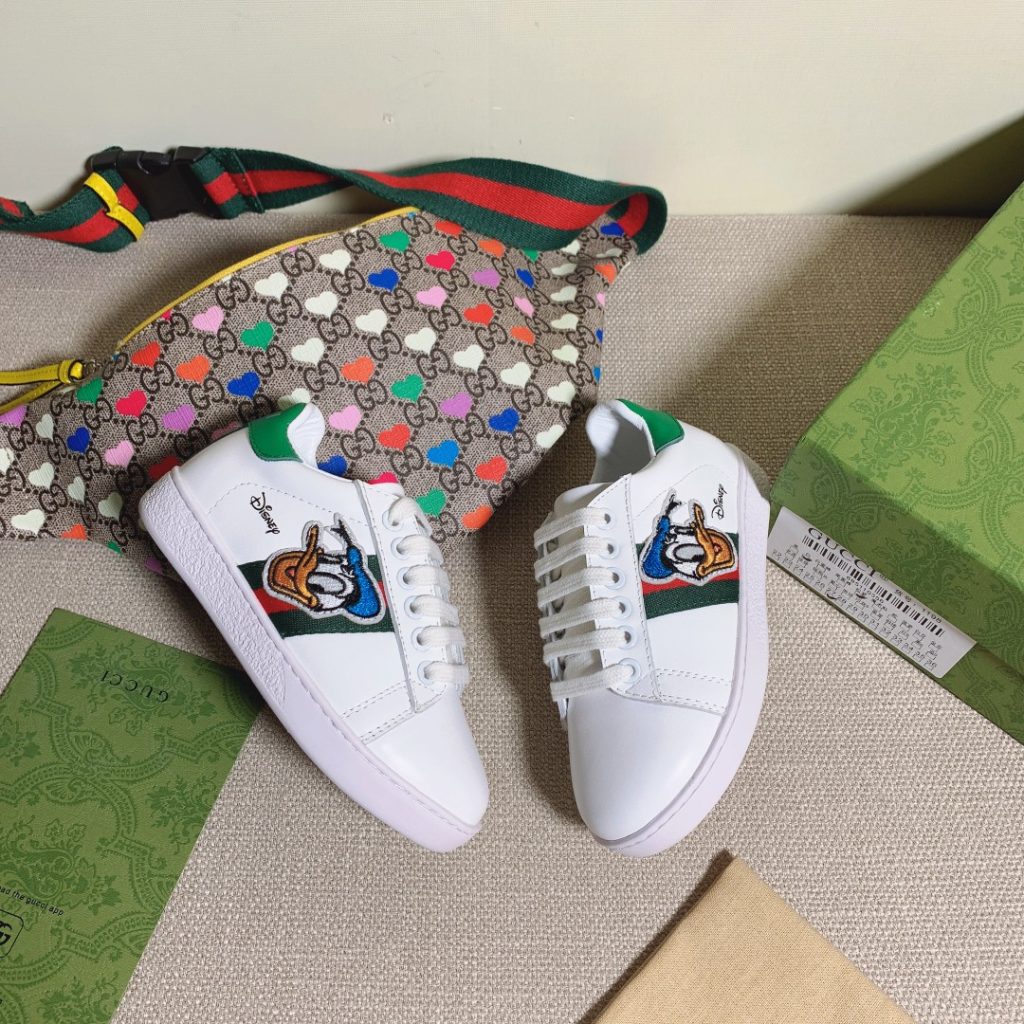 Gucci White Leather Sneakers with Cartoon Patch and Green Ac