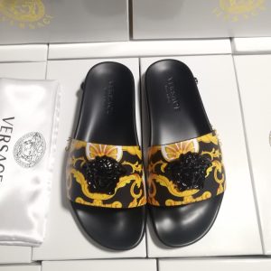 Versace Black and Yellow Slide Sandals with Lion Head Design