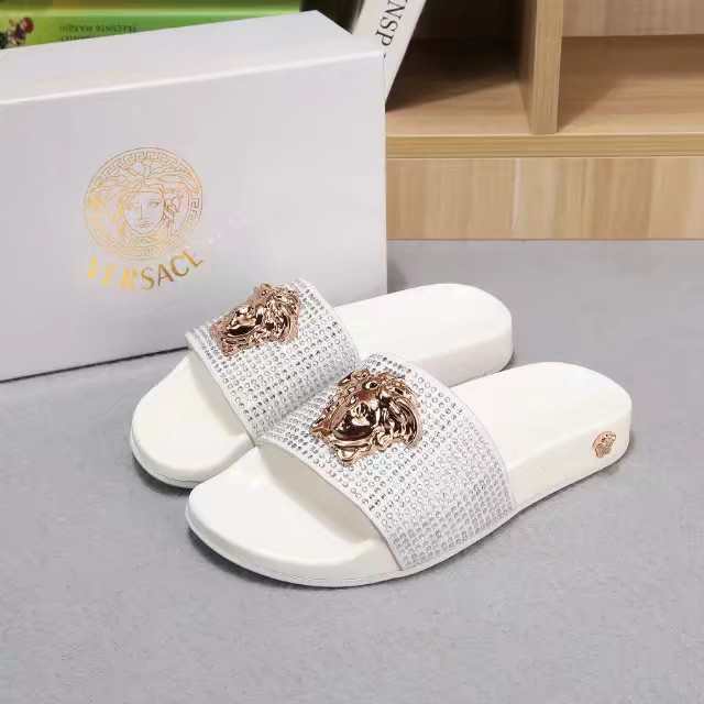 Versace White Crystal Slide Sandals with Lion Head Design