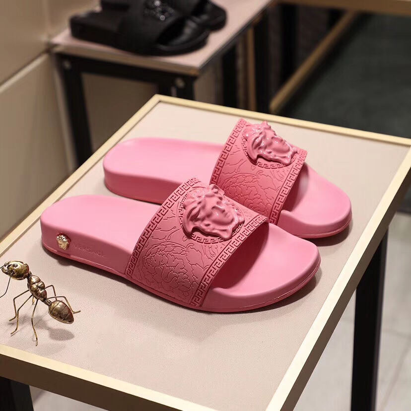 Versace Pink Rubber Slides with Lion Head Design