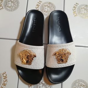 Versace White Embossed Slide Sandals with Gold Lion Head Det
