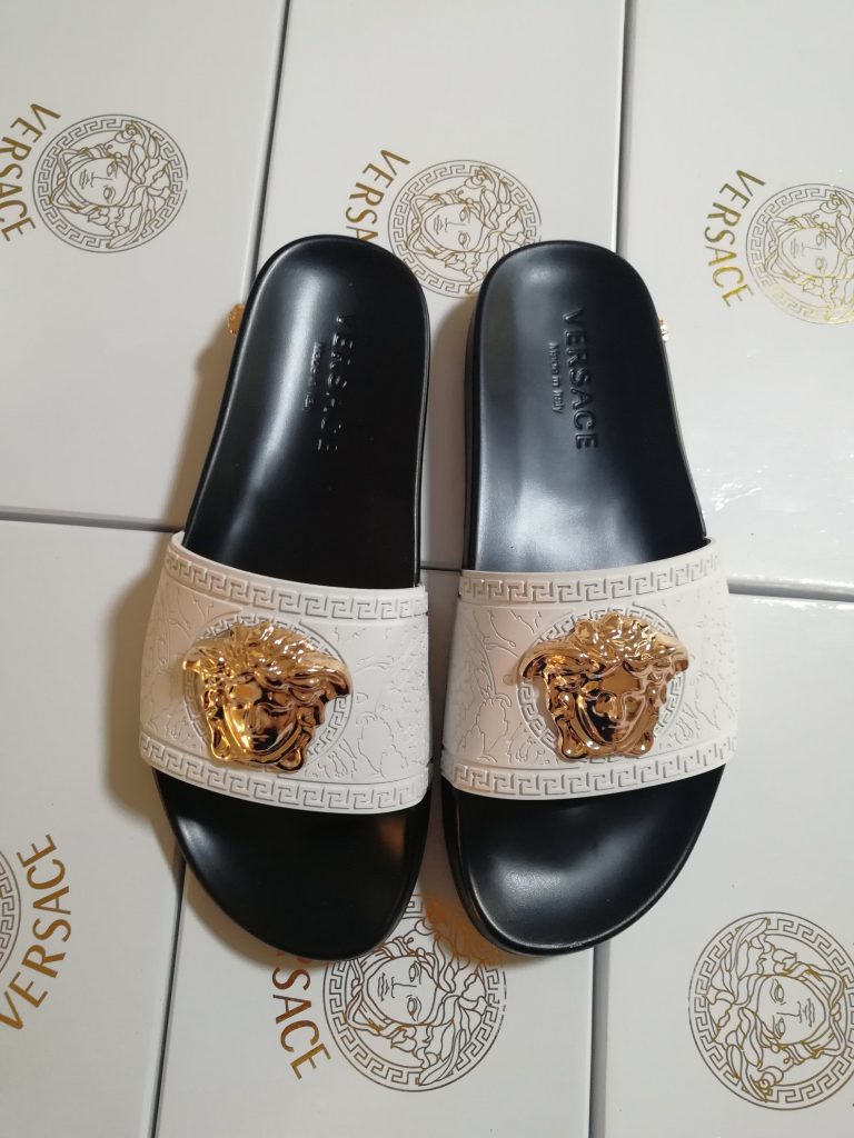 Versace White Embossed Slide Sandals with Gold Lion Head Det