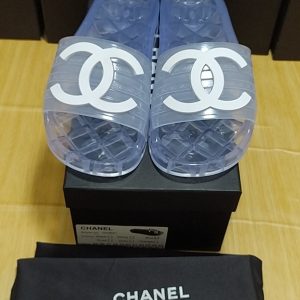 Chanel Clear Logo Slide Sandals in Blue Transparent Rubber