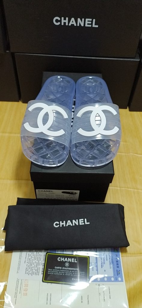Chanel Clear Logo Slide Sandals in Blue Transparent Rubber