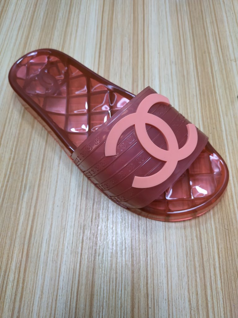 Chanel Red Plastic Slides with Logo Emblem