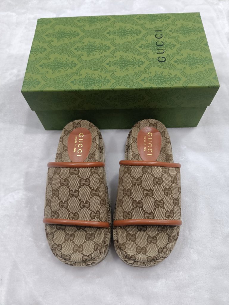Gucci Women’s GG Monogram Slides in Beige with Orange Accent