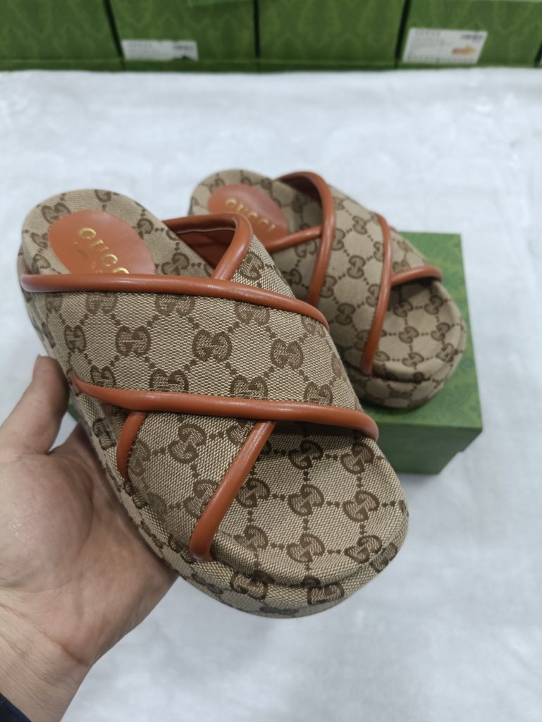 Gucci Brown Monogram Platform Slides with Cross Strap Design