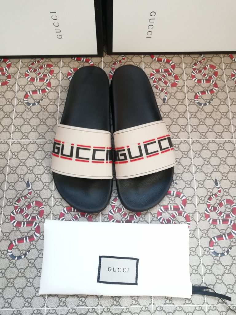 Gucci Men’s Logo Slide Sandals in Beige and Black Rubber