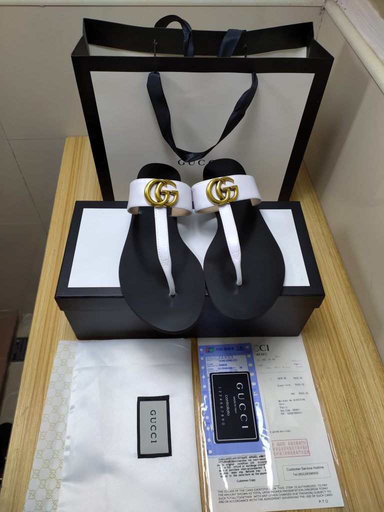 Gucci Women’s Black and White Leather Logo Sandals