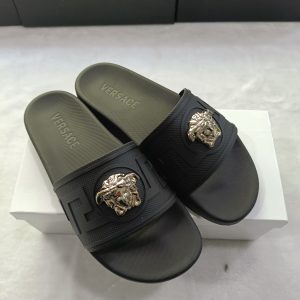Versace Black Slide Sandals with Gold Lion Head Detail