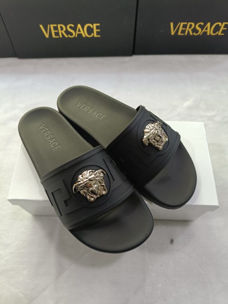 Versace Black Slide Sandals with Gold Lion Head Detail