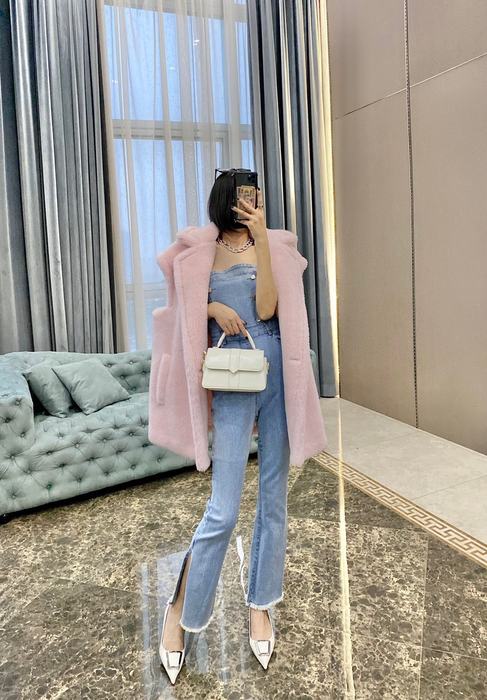Pink-Faux-Fur-Vest-with-Denim-Jumpsuit-and-White-Handbag-for