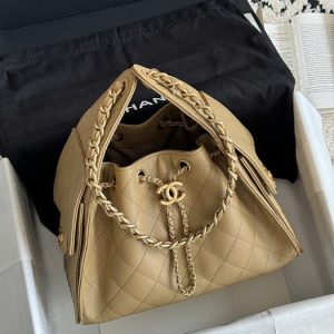 Chanel Quilted Beige Drawstring Bag