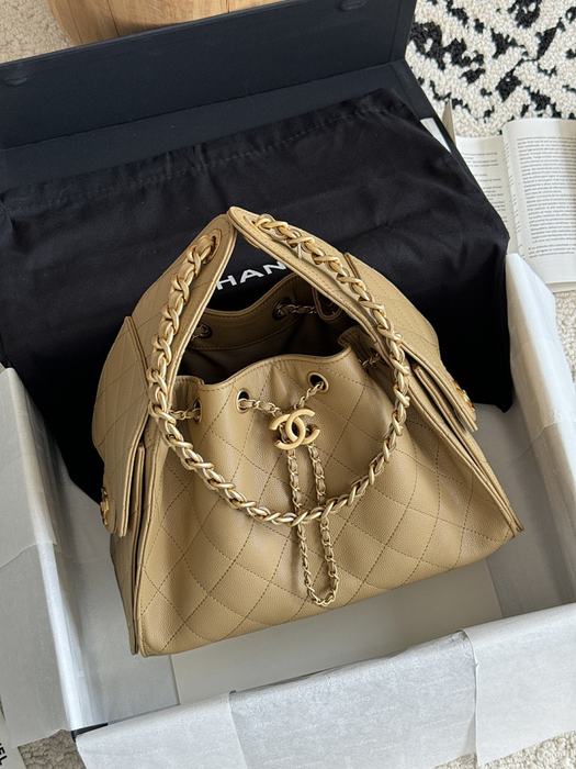 Chanel Quilted Beige Drawstring Bag
