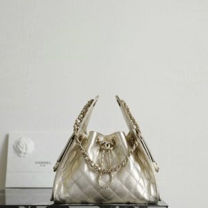 Chanel Quilted Metallic Gold Drawstring Bag