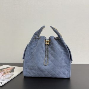 Chanel Quilted Suede Drawstring Tote Bag