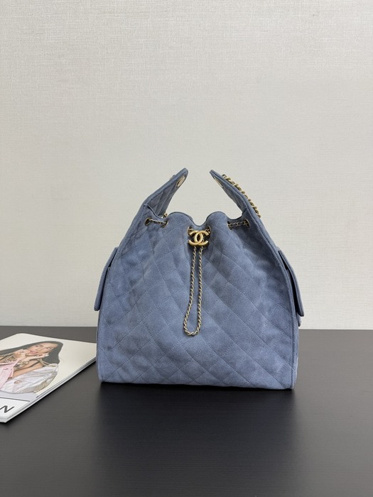 Chanel Quilted Suede Drawstring Tote Bag