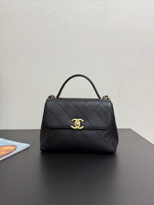 Chanel black quilted leather top handle bag