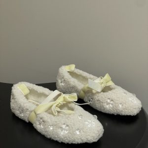 Miumiu-shearling-and-rhinestone-flat-shoes,-sizes-35-40,-December-17,-2025.-2